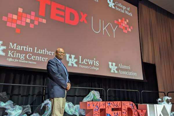 Bryson on stage at TEDxUKY